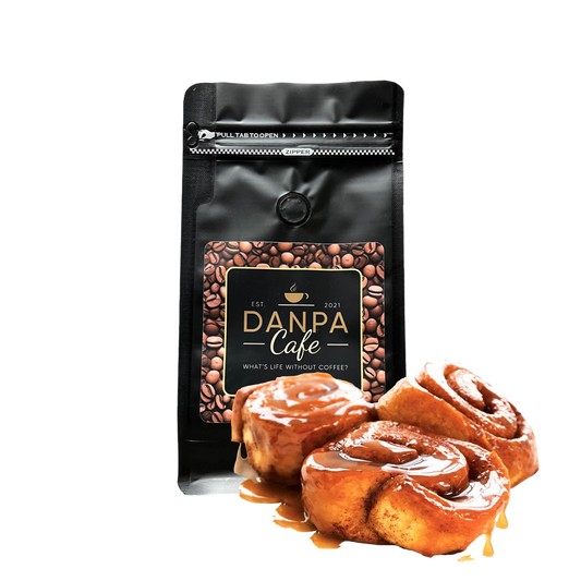 Sticky Bun product featuring caramelized cinnamon rolls with coffee beans
